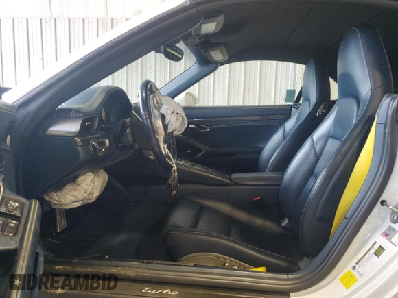 2015 Porsche 911 Turbo z VIN WP0CD2A91FS178328, wystawiony jako Copart lot #57880135 z przebiegiem 34 588 mil mil oraz Szkoda całkowita • Salvage title. Historia ofert i sprzedaży dostępna na DreamBid. Obrazek 7.