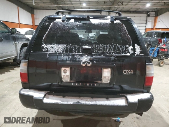 2000 Infiniti QX4 z VIN JNRAR07Y6YW080306, wystawiony jako Copart lot #85022064 z przebiegiem 278 383 mil mil oraz Tytuł czysty. Historia ofert i sprzedaży dostępna na DreamBid. Obrazek 6.
