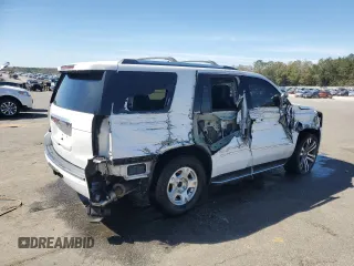2015 GMC Yukon Denali with VIN 1GKS1CKJ9FR566390, listed as a Copart auction lot 48472835 with 167,719 mi miles and Salvage Title. Bid and sale history available at carsss.com. Image 3.