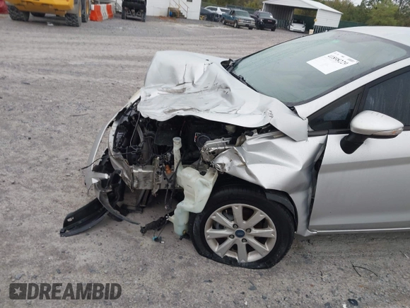2013 Ford Fiesta SE with VIN 3FADP4EJ6DM107293, listed as a IAAI auction lot 41898229 with 129,694 mi miles. Bid and sale history available at carsss.com. Image 6.