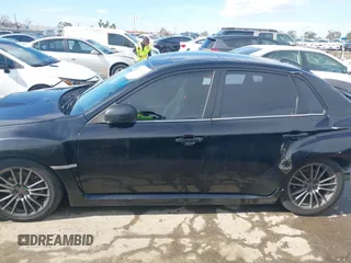 2014 Subaru Impreza Sedan WRX WRX Premium with VIN JF1GV7F6XEG011659, listed as a IAAI auction lot 41408915 with 133,836 mi miles. Bid and sale history available at carsss.com. Image 14.