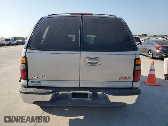 2004 GMC Yukon SLE z VIN 1GKEC13V64R277493, wystawiony jako Copart lot #68819754 z przebiegiem 125 731 mil mil oraz Szkoda całkowita • Salvage title. Historia ofert i sprzedaży dostępna na DreamBid. Obrazek 6.