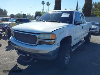 2000 GMC Sierra 1500 SLT with VIN 1GTEC19T7YZ241853, listed as a IAAI auction lot 41657692 with 166,517 mi miles. Bid and sale history available at carsss.com. Image 18.