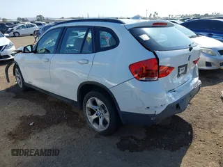 2013 BMW X1 28i with VIN WBAVM1C52DVW45195, listed as a IAAI auction lot 41964903 with 1 mi miles. Bid and sale history available at carsss.com. Image 3.