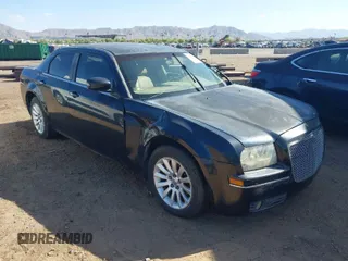 2007 Chrysler 300 Touring with VIN 2C3KA53G97H792641, listed as a IAAI auction lot 42071649 with 144,258 mi miles. Bid and sale history available at carsss.com. Image 1.