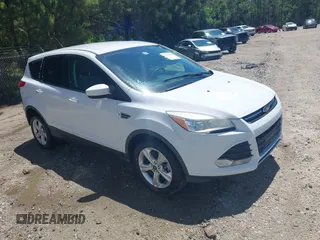 2014 Ford Escape SE with VIN 1FMCU9G90EUB76911, listed as a IAAI auction lot 42143518 with 123,466 mi miles and . Bid and sale history available at DreamBid. Image 1.