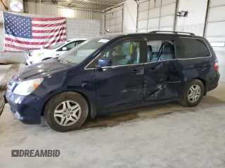 2006 Honda Odyssey EX-L with VIN 5FNRL38796B077686, listed as a Copart auction lot 59000305 with 127,083 mi miles and Salvage title. Bid and sale history available at DreamBid. Image 1.