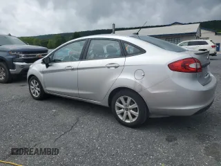 2013 Ford Fiesta SE z VIN 3FADP4BJ9DM108667, wystawiony jako Copart lot #58542295 z przebiegiem 94 812 mil mil oraz Szkoda całkowita • Salvage title. Historia ofert i sprzedaży dostępna na DreamBid. Obrazek 2.