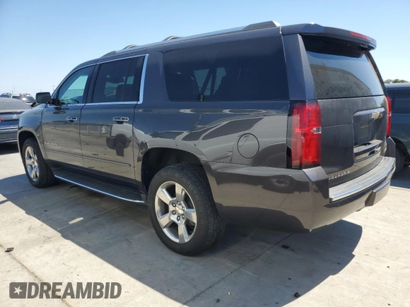 2018 Chevrolet Suburban Premier with VIN 1GNSCJKC4JR189639, listed as a Copart auction lot 64221035 with 110,256 mi miles and Salvage title. Bid and sale history available at DreamBid. Image 2.