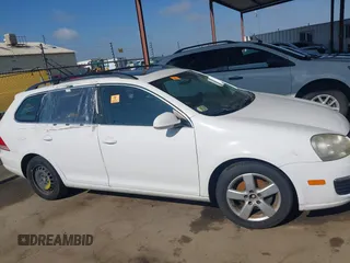 2009 Volkswagen Jetta z VIN 3VWTZ71K39M286381, wystawiony jako IAAI lot #42126439 z przebiegiem 138 297 mil mil oraz . Historia ofert i sprzedaży dostępna na DreamBid. Obrazek 12.