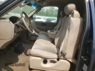 2002 Ford F-150 XL z VIN 1FTRX18L12NB86774, wystawiony jako Copart lot #59634165 z przebiegiem 262 567 mil mil oraz Szkoda całkowita • Salvage title. Historia ofert i sprzedaży dostępna na DreamBid. Obrazek 7.