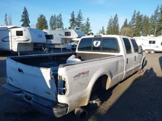1999 Ford Super Duty F-350 SRW XL with VIN 1FTSW31F0XEE53396, listed as a IAAI auction lot 41383093 with 307,697 mi miles. Bid and sale history available at carsss.com. Image 4.