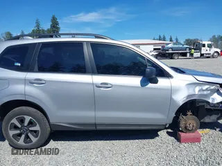 2018 Subaru Forester with VIN JF2SJABC1JH460789, listed as a IAAI auction lot 42631854 with 86,215 mi miles and . Bid and sale history available at DreamBid. Image 14.