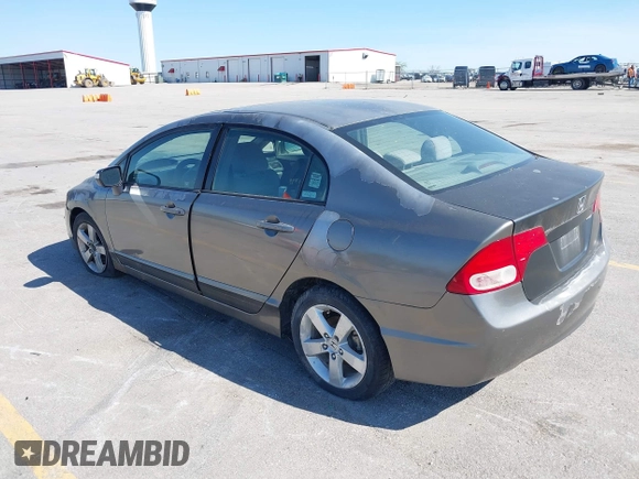 2007 Honda Civic EX with VIN 1HGFA16897L057396, listed as a IAAI auction lot 42175378 with 166,360 mi miles and . Bid and sale history available at DreamBid. Image 3.