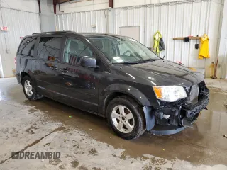 2012 Dodge Grand Caravan SXT with VIN 2C4RDGCG0CR191037, listed as a Copart auction lot 50930675 with 142,093 mi miles and Salvage Title. Bid and sale history available at DreamBid. Image 4.