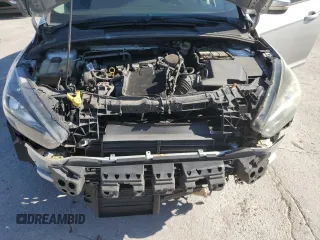 2015 Ford Focus SE z VIN 1FADP3F25FL283595, wystawiony jako Copart lot #57966705 z przebiegiem 182 405 mil mil oraz Szkoda całkowita • Salvage title. Historia ofert i sprzedaży dostępna na DreamBid. Obrazek 11.