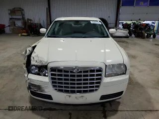 2007 Chrysler 300 with VIN 2C3LA43R37H879385, listed as a Copart auction lot 65837564 with 144,062 mi miles and Salvage Title. Bid and sale history available at carsss.com. Image 5.