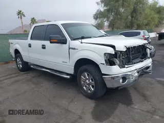 2013 Ford F-150 XL with VIN 1FTFW1ET7DKD70468, listed as a IAAI auction lot 40952588 with 208,052 mi miles. Bid and sale history available at carsss.com. Image 1.