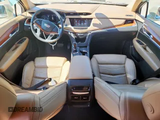 2017 Cadillac XT5 Platinum AWD z VIN 1GYKNFRS0HZ111747, wystawiony jako Copart lot #57666415 z przebiegiem 72 632 mil mil oraz Szkody całkowita. Historia ofert i sprzedaży dostępna na DreamBid. Obrazek 8.