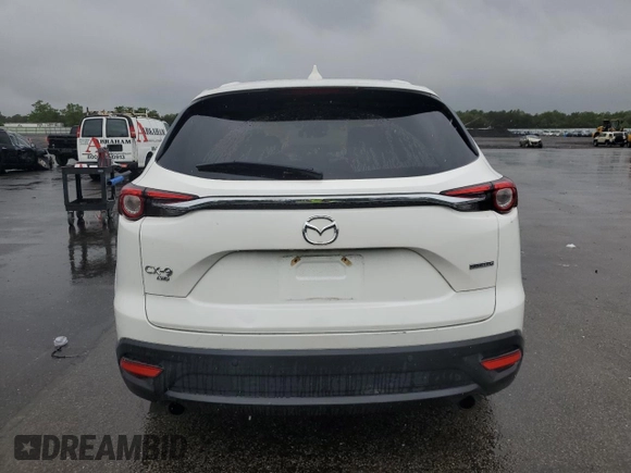 2021 Mazda CX-9 Touring z VIN JM3TCBCY1M0536616, wystawiony jako Copart lot #60242445 z przebiegiem 40 057 mil mil oraz Szkoda całkowita • Salvage title. Historia ofert i sprzedaży dostępna na DreamBid. Obrazek 6.