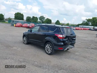 2018 Ford Escape Titanium z VIN 1FMCU9J9XJUB66275, wystawiony jako IAAI lot #42757952 z przebiegiem 97 629 mil mil oraz . Historia ofert i sprzedaży dostępna na DreamBid. Obrazek 3.