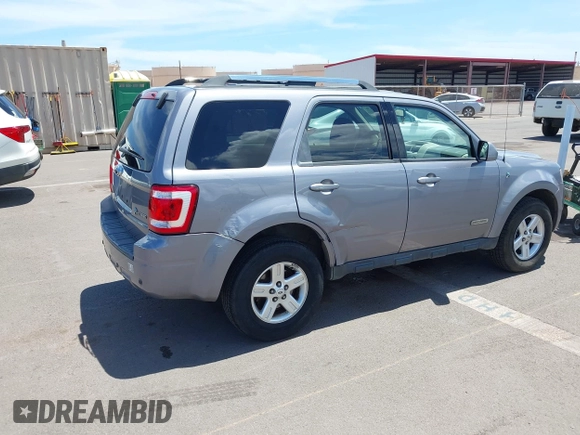 2008 Ford Escape Hybrid z VIN 1FMCU49HX8KC68082, wystawiony jako IAAI lot #42806471 z przebiegiem 104 848 mil mil oraz . Historia ofert i sprzedaży dostępna na DreamBid. Obrazek 4.