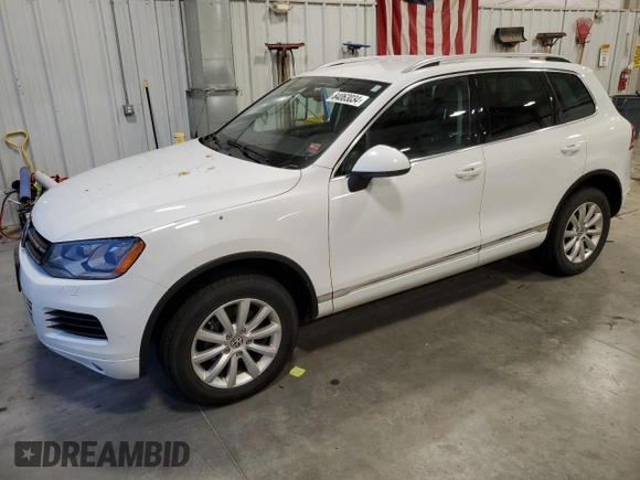 2012 Volkswagen Touareg Exec with VIN WVGEF9BP4CD011823, listed as a Copart auction lot 84063034 with 110,694 mi miles and Non Repairable. Bid and sale history available at DreamBid. Image 1.