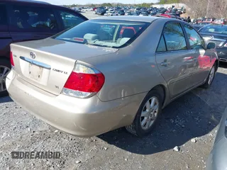 2006 Toyota Camry LE z VIN 4T1BF32K16U118594, wystawiony jako IAAI lot #41558030 z przebiegiem 275 360 mil mil oraz . Historia ofert i sprzedaży dostępna na DreamBid. Obrazek 4.