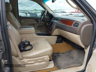 2011 Chevrolet Suburban LT with VIN 1GNSCJE03BR267184, listed as a IAAI auction lot 42156424 with 307,618 mi miles. Bid and sale history available at carsss.com. Image 5.