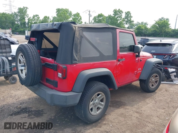 2009 Jeep Wrangler X with VIN 1J4FA24129L716085, listed as a IAAI auction lot 42425012 with 118,859 mi miles and . Bid and sale history available at DreamBid. Image 4.