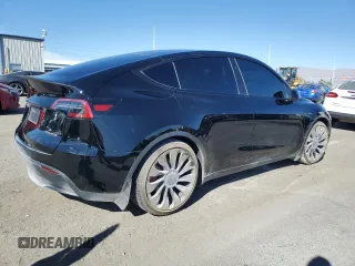 2023 Tesla Model Y Performance with VIN 7SAYGDEF8PF925238, listed as a Copart auction lot 46276925 with 28,201 mi miles and Salvage Title. Bid and sale history available at DreamBid. Image 3.