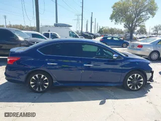 2017 Nissan Sentra SV with VIN 3N1AB7AP6HY217592, listed as a IAAI auction lot 41704161 with 103,649 mi miles. Bid and sale history available at carsss.com. Image 14.