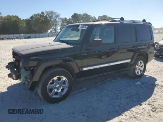2006 Jeep Commander Limited with VIN 1J8HH58N56C291880, listed as a Copart auction lot 71543874 with 217,366 mi miles and Salvage Title. Bid and sale history available at carsss.com. Image 1.