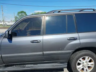 2003 Lexus LX with VIN JTJHT00W233532297, listed as a IAAI auction lot 42189676 with 235,992 mi miles. Bid and sale history available at carsss.com. Image 14.