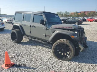 2018 Jeep Wrangler Unlimited Rubicon with VIN 1C4HJXFN9JW315938, listed as a Copart auction lot 86741084 with 83,965 mi miles and Salvage title. Bid and sale history available at DreamBid. Image 4.
