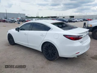 2018 Mazda 6 Grand Touring Reserve with VIN JM1GL1WY1J1321517, listed as a IAAI auction lot 39411226 with 50,280 mi miles and . Bid and sale history available at DreamBid. Image 3.