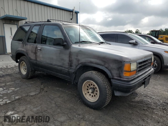 1991 Ford Explorer with VIN 1FMCU24X1MUE22373, listed as a Copart auction lot 59693395 with 41,552 mi miles and Salvage title. Bid and sale history available at DreamBid. Image 4.