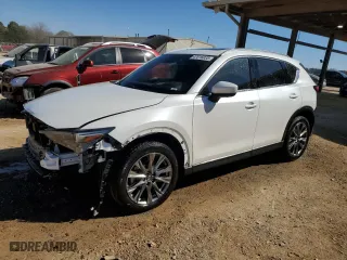 2021 Mazda CX-5 Signature with VIN JM3KFBEY5M0352778, listed as a Copart auction lot 47016035 with 37,961 mi miles and Salvage Title. Bid and sale history available at carsss.com. Image 1.
