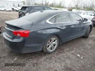 2014 Chevrolet Impala LT with VIN 2G1125S35E9303056, listed as a IAAI auction lot 42019162 with 190,427 mi miles and . Bid and sale history available at DreamBid. Image 4.