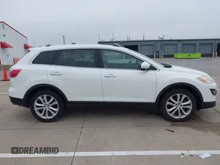 2012 Mazda CX-9 Grand Touring с VIN JM3TB2DA3C0354645, выставлен на аукционе IAAI как лот 42447164 с пробегом 212 014 миль миль и . История ставок и продаж доступна на DreamBid. Изображение 13.