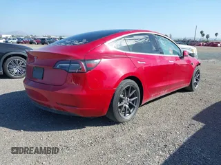 2020 Tesla Model 3 Standard Range Plus with VIN 5YJ3E1EA7LF706636, listed as a IAAI auction lot 32371217 with 35,389 mi miles. Bid and sale history available at carsss.com. Image 4.