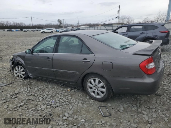 2004 Toyota Camry LE with VIN 4T1BE30K14U918475, listed as a Copart auction lot 47646465 with 258,973 mi miles and Salvage Title. Bid and sale history available at DreamBid. Image 2.