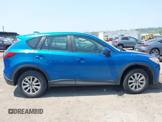 2014 Mazda CX-5 Sport z VIN JM3KE4BE4E0367444, wystawiony jako IAAI lot #42431272 z przebiegiem 181 191 mil mil oraz . Historia ofert i sprzedaży dostępna na DreamBid. Obrazek 13.