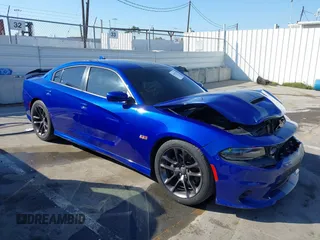 2020 Dodge Charger Scat Pack z VIN 2C3CDXGJ8LH175139, wystawiony jako IAAI lot #41670976 z przebiegiem 82 018 mil mil oraz . Historia ofert i sprzedaży dostępna na DreamBid. Obrazek 1.