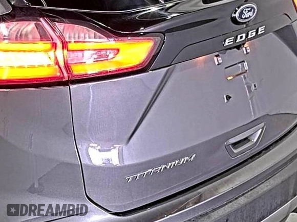 2021 Ford Edge Titanium z VIN 2FMPK3K92MBA53689, wystawiony jako IAAI lot #42501151 z przebiegiem 93 941 mil mil oraz . Historia ofert i sprzedaży dostępna na DreamBid. Obrazek 19.