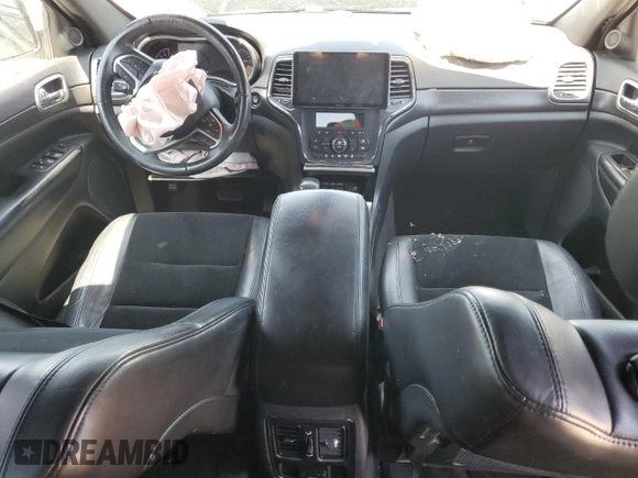 2018 Jeep Grand Cherokee Altitude with VIN 1C4RJFAGXJC267021, listed as a Copart auction lot 58762945 with 93,347 mi miles and Salvage title. Bid and sale history available at DreamBid. Image 8.