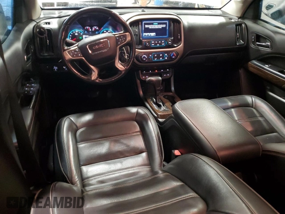 2018 GMC Canyon 4WD Denali z VIN 1GTG6EEN6J1171037, wystawiony jako Copart lot #52521865 z przebiegiem 99 931 mil mil oraz Szkoda całkowita • Salvage title. Historia ofert i sprzedaży dostępna na DreamBid. Obrazek 8.