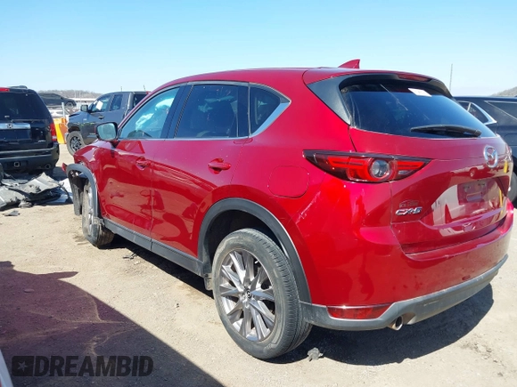 2019 Mazda CX-5 Grand Touring with VIN JM3KFADM5K1556917, listed as a IAAI auction lot 41706323 with 77,804 mi miles. Bid and sale history available at carsss.com. Image 3.