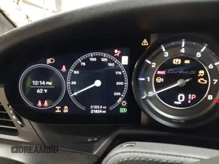 2024 Porsche 911 Turbo z VIN WP0AD2A96RS252418, wystawiony jako IAAI lot #42309087 z przebiegiem 21 824 mil mil oraz . Historia ofert i sprzedaży dostępna na DreamBid. Obrazek 7.