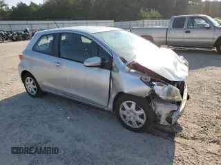 2014 Toyota Yaris L with VIN VNKJTUD30EA006137, listed as a Copart auction lot 72061304 with 104,664 mi miles and Salvage Title. Bid and sale history available at carsss.com. Image 4.